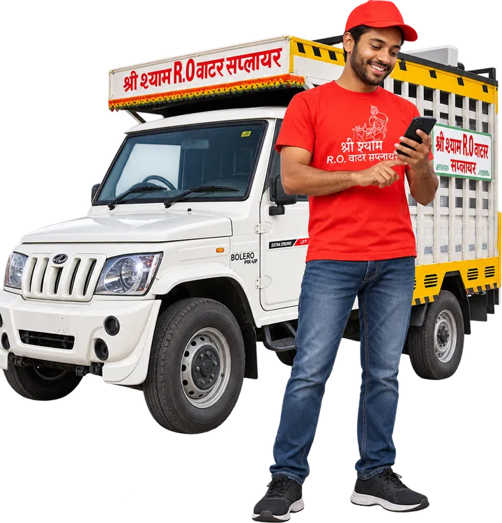 Shree Shyam delivery driver beside the delivery vehicle, checking an update on a phone